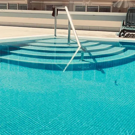 Poseidon En Playa Arena 圣地亚哥港