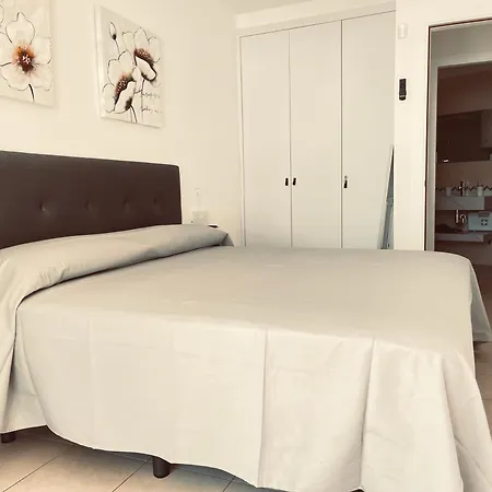 Poseidon En Playa Arena