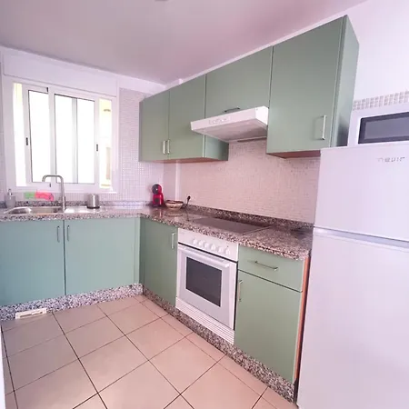 Poseidon En Playa Arena *