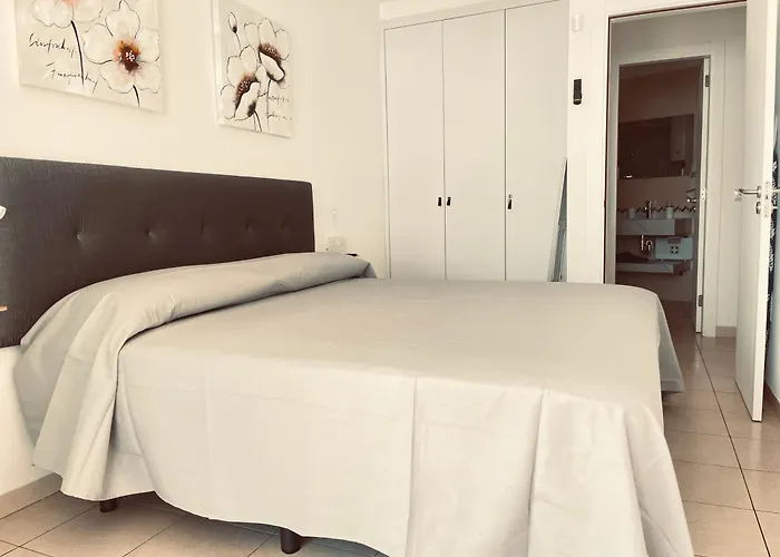 Poseidon En Playa Arena