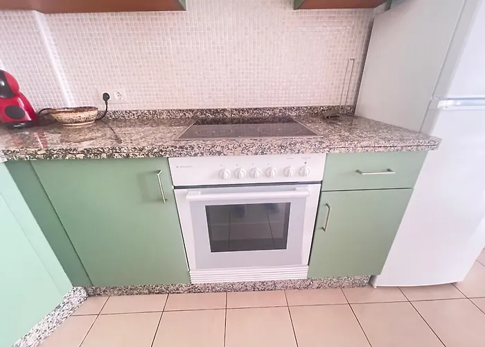 Poseidon En Playa Arena *