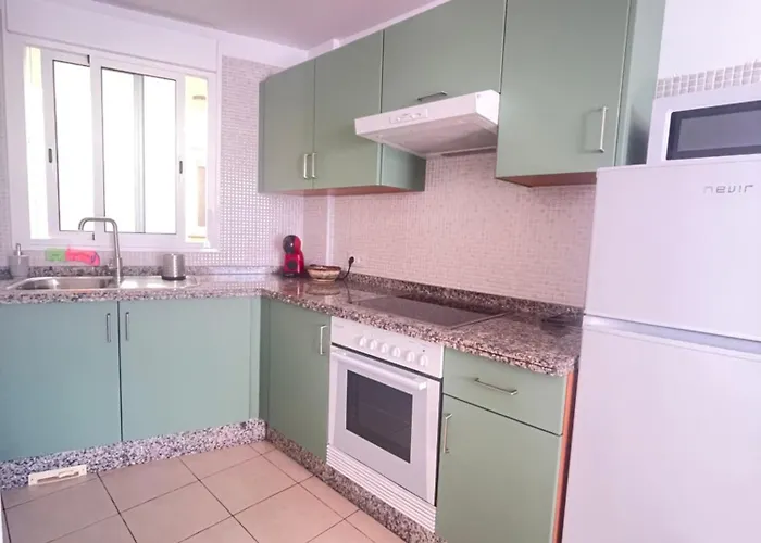 Poseidon En Playa Arena *